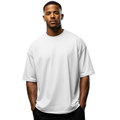 Man wearing a plain white Macbee oversized t-shirt on a white background