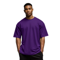 Man wearing a purple Macbee oversized t-shirt on a white background