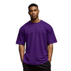 Man wearing a purple Macbee oversized t-shirt on a white background