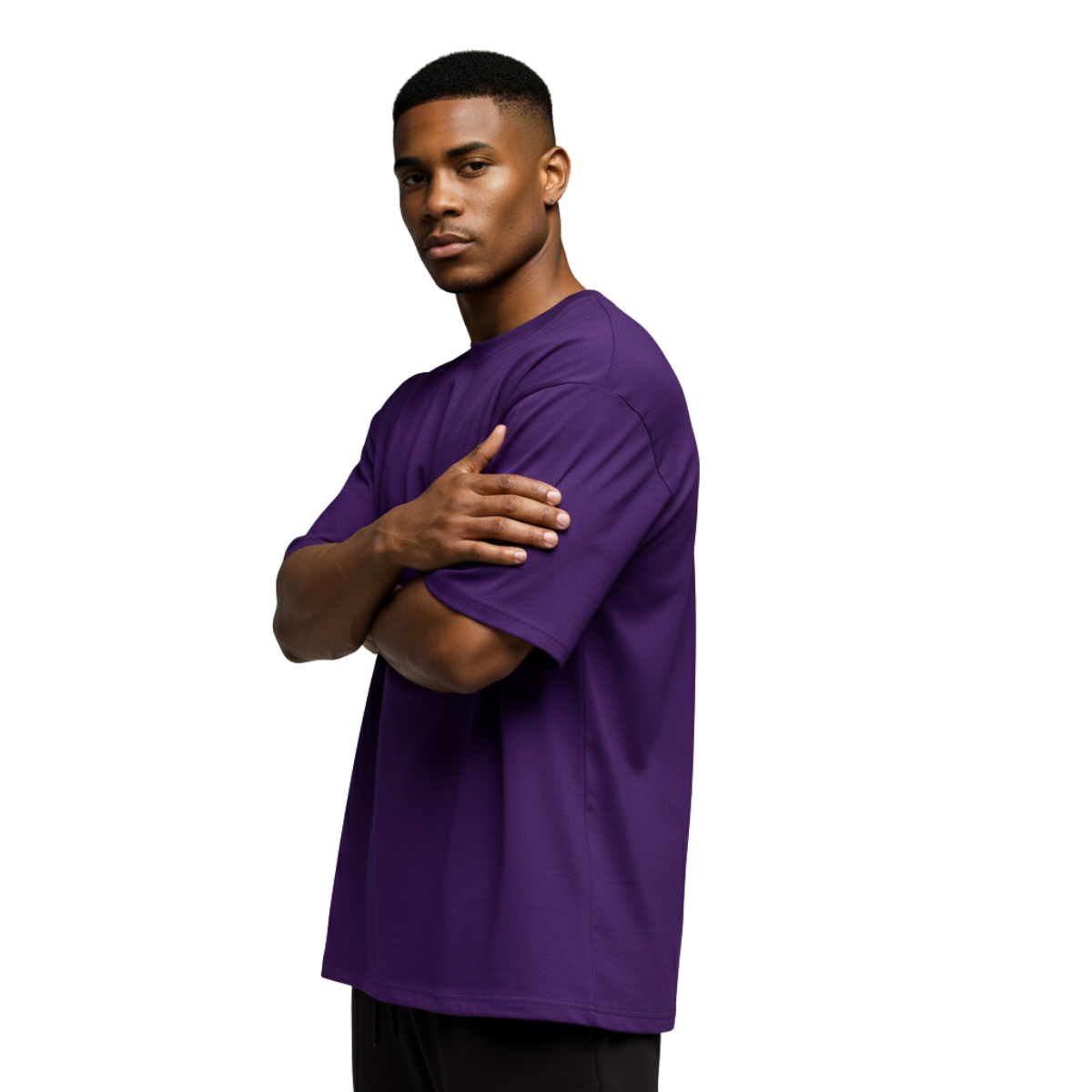 Man wearing a purple Macbee oversized t-shirt on a white background