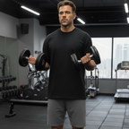 Man lifting dumbbells in a gym setting